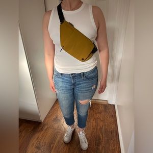 Yellow Lulu phanny pack. Can be worn around the chest or waist. Unisex